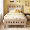 Twin size wood bed frame with upholstered headboard in mid-century style, featuring a sturdy design and cozy bedding.