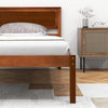 Twin size bed frame with wooden headboard, slat support, and 12" under bed storage for a tidy room.