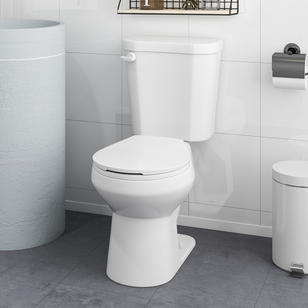 Two-piece round toilet with 17.5" ADA comfort height seat, soft-close lid, and stain-resistant ceramic for easy.