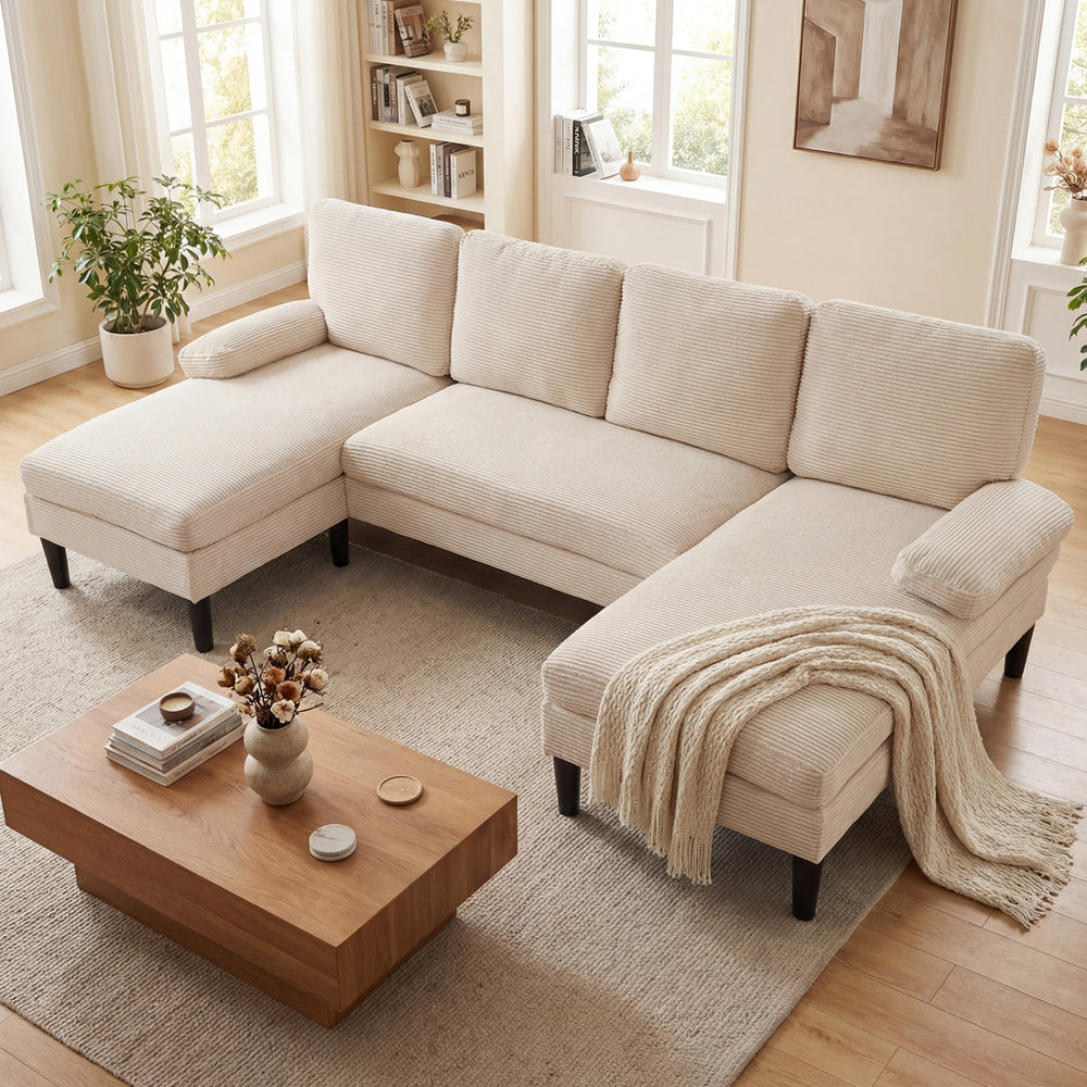 U-shaped sectional couch in beige with dual chaise lounges, soft corduroy fabric, perfect for living room gatherings.