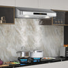 Under cabinet range hood with stainless steel finish, 900 CFM airflow, and LED lights for efficient kitchen ventilation.