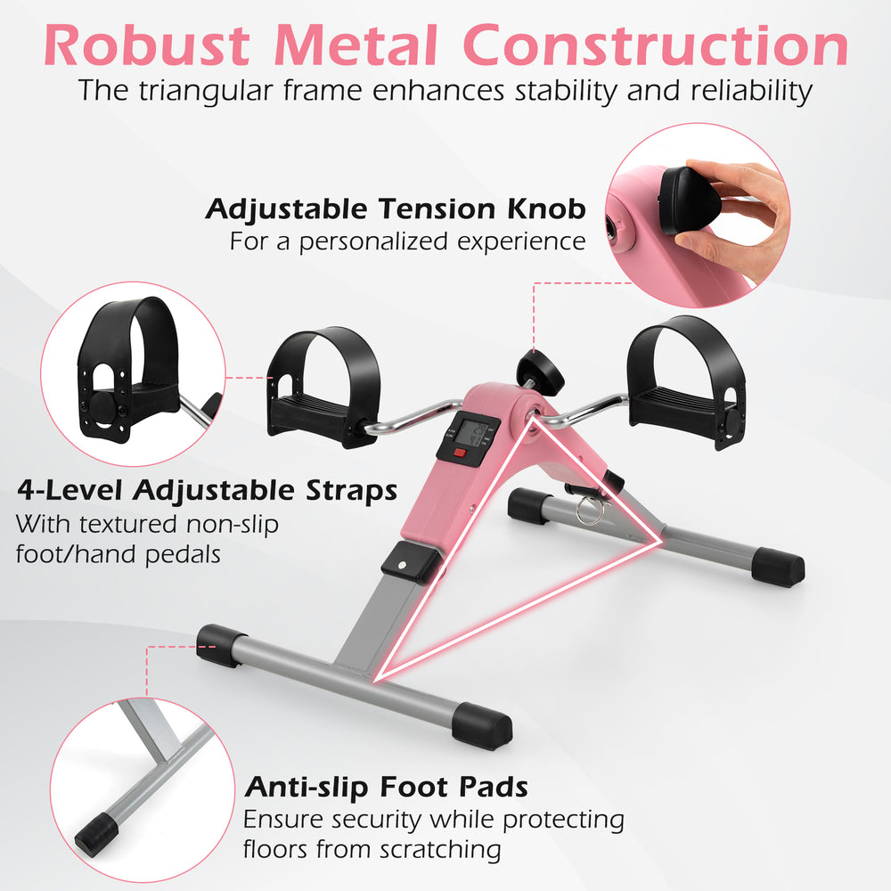 Under desk exercise bike pedal exerciser in pink with adjustable straps and LCD display for legs and arms workout.