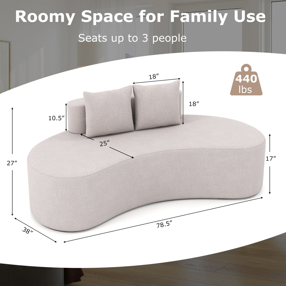 Curved upholstered sofa in gray with two cozy pillows, seating up to 3 people, ideal for living rooms and offices.