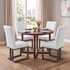 Upholstered dining chairs set of 4 in white with rubber wood legs, featuring padded seats and ergonomic backrests for comfort.