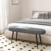 Upholstered gray entryway bench with button tufting and metal frame, perfect for bedrooms or entryways.