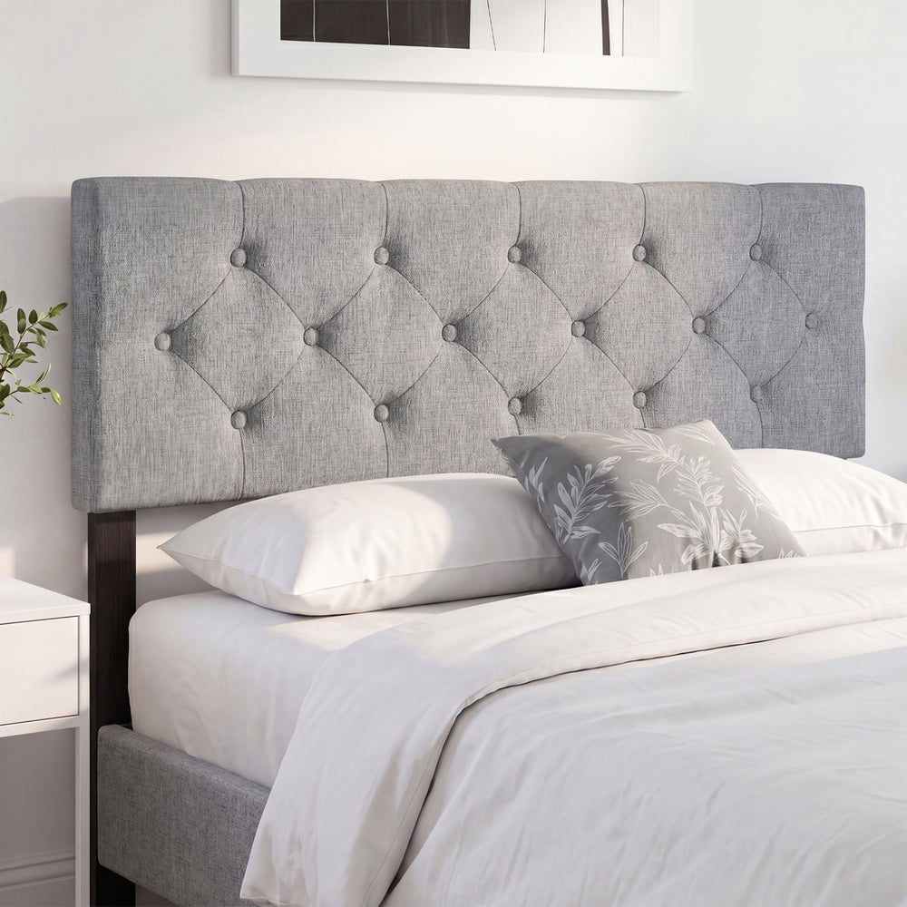 Tufted gray upholstered headboard for queen/full size bed, featuring soft cushioning and adjustable design for comfort.