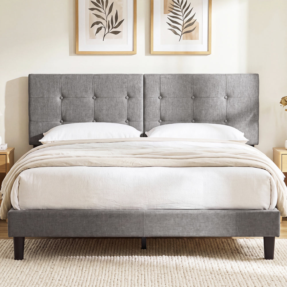 Upholstered headboard with adjustable width, showcasing a clean, modern look with vertical channel tufting and neutral linen fabric.