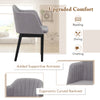 Curved backrest upholstered velvet dining chair in grey with supportive armrests, perfect for dining and chatting.