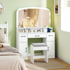 Curved mirror of the white vanity desk makeup table with dimmable LED lights and built-in charging station for.