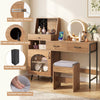 Vanity desk with a 360-degree rotatable mirror, storage drawers, and cushioned stool for comfortable makeup application.