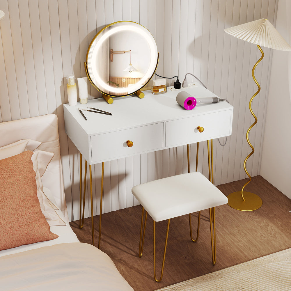 White vanity desk with lighted adjustable mirror, two drawers, and gold metal legs, perfect for bedroom styling.