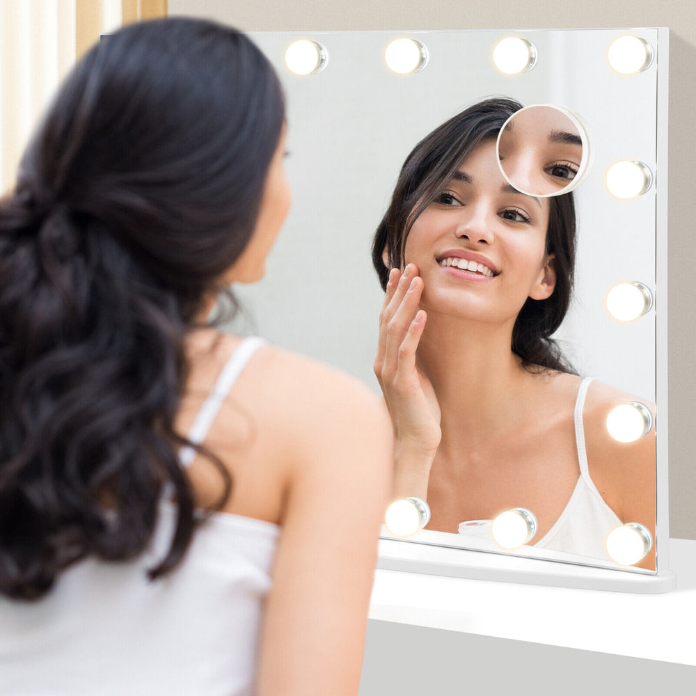 Vanity mirror with 18 dimmable LED bulbs, 3 color lighting modes, and 3X magnifying mirror for detailed reflection.