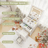 3-in-1 vanity set in white featuring a flip-up mirror, cushioned stool, and ample storage space for beauty items.