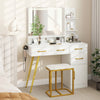 Vanity set with adjustable LED mirror, white finish, and gold accents, featuring organized storage and a padded stool.