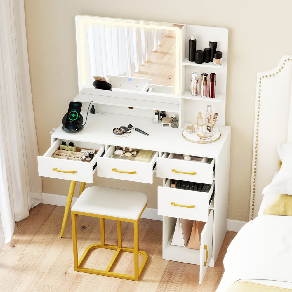 Vanity set with large adjustable mirror and LED lights, featuring organized storage and a cozy padded seat for comfort.