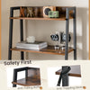 Ladder vanity desk set with flip top mirror, black finish, featuring shelves and cushioned stool for compact storage.