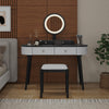 Makeup vanity table set in white and black with LED mirror, cushioned stool, and three spacious drawers for storage.