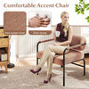 Velvet upholstered accent chair with cylindrical backrest and metal armrests, ideal for living room or home office use.