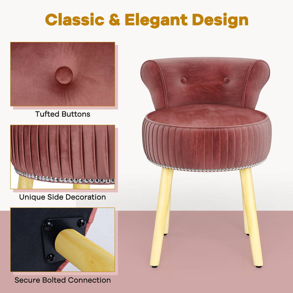 Velvet vanity chair in pink with tufted low back, solid wood legs, and unique side decoration for elegant styling.