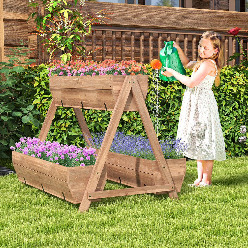 Vertical raised garden bed with three wooden planter boxes, made of fir wood, ideal for growing diverse plants outdoors.