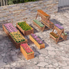 Aerial view of vertical raised garden bed with three wooden planter boxes, showcasing colorful plants for outdoor.