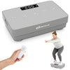 Vibration plate exercise machine in gray showing a user performing squats, designed for versatile home workouts.