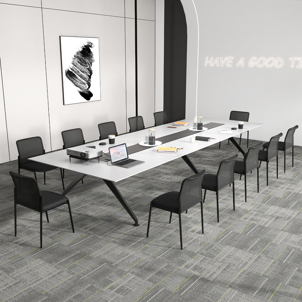 Black waiting room chair set arranged around a sleek conference table, showcasing ergonomic design and professional.
