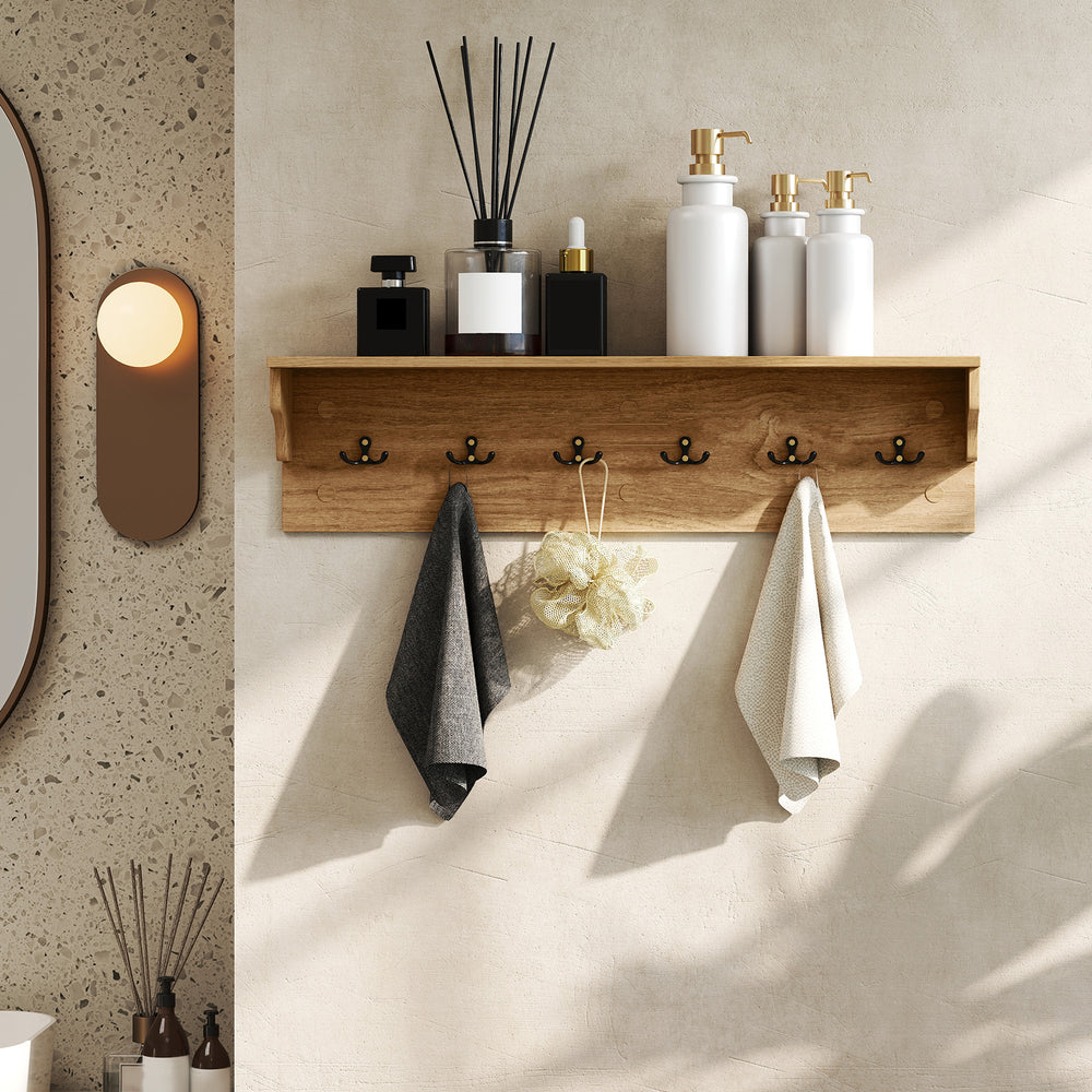 Wooden coat rack with shelf and 6 hooks, featuring natural wood grains, ideal for towels and accessories in any room.