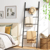 Wall-leaning decorative blanket holder with 5 removable hooks, featuring a durable metal frame, perfect for bedroom.