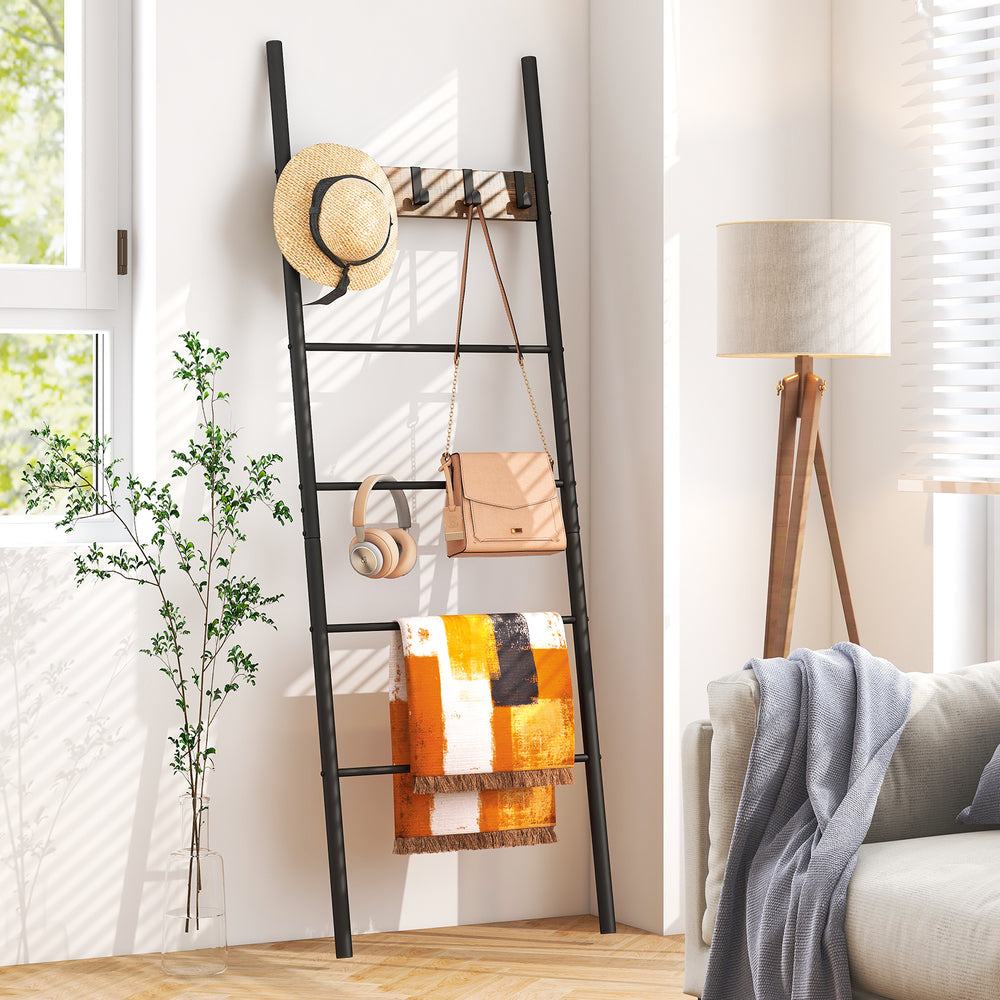 Wall-leaning decorative blanket holder with 5 removable hooks, featuring a durable metal frame for stylish storage.
