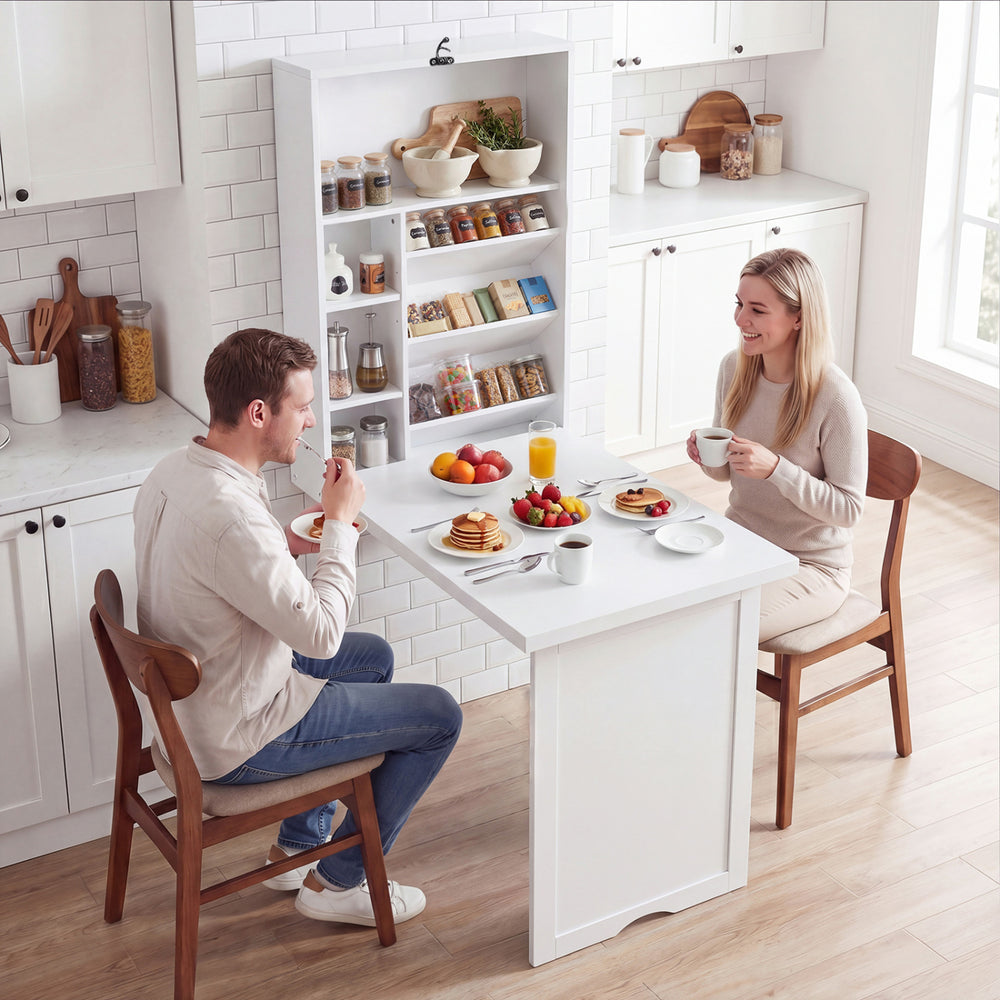Wall-mounted fold-out convertible desk in white, featuring ample storage and a wide tabletop for versatile use.
