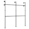 Wall-mounted black pipe clothing rack with 4 hanging rods, designed for durable organization in closets or retail.