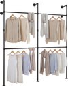 Wall-mounted black clothing rack with four hanging rods, featuring a double-tier design for organized apparel storage.