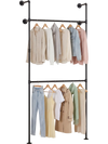 Wall-mounted black clothing rack with two hanging rods, featuring coats and dresses for organized storage in small.