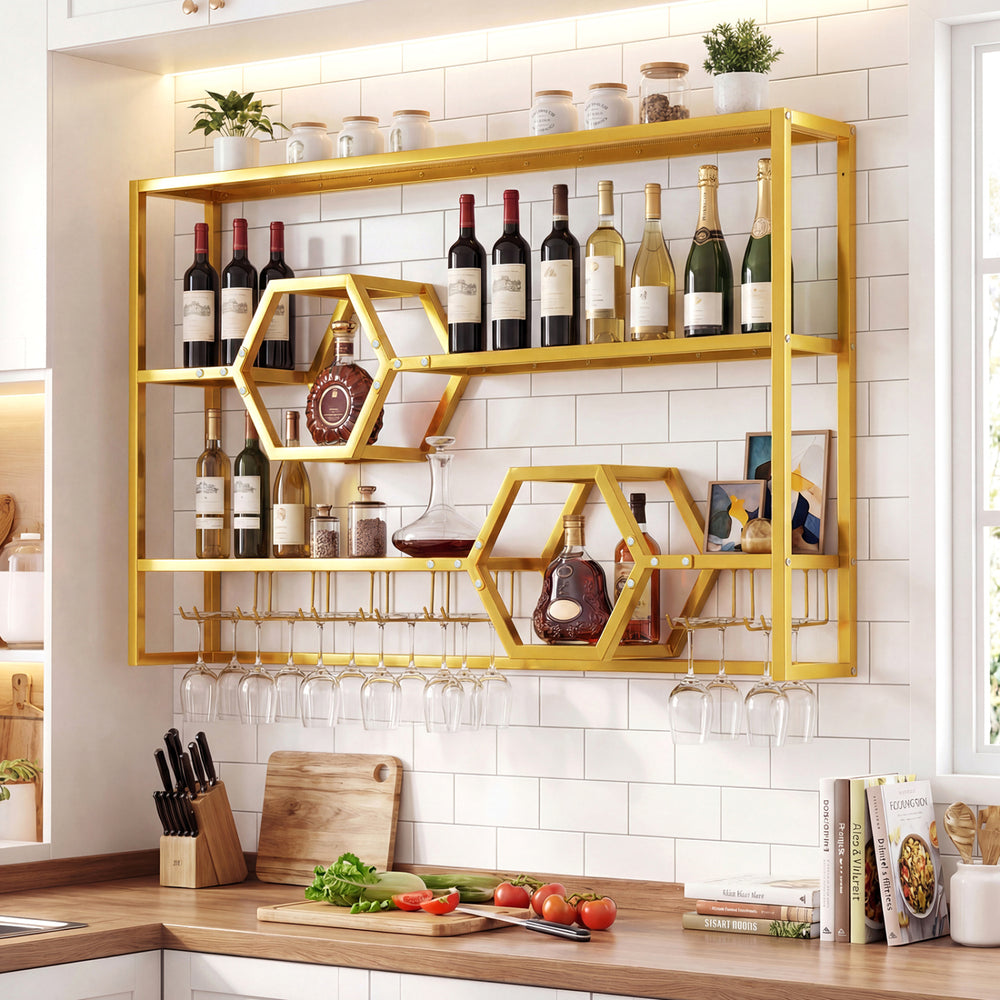 Gold wall-mounted wine rack with three shelves and two honeycomb cubbies for stylish storage and organization.