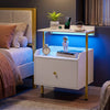 Wall-mounted nightstand in white with LED lights, charging station, and storage drawer for bedroom organization.