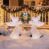 Two gradient warm pink angels holding a wreath, made of weather-resistant PVC for festive outdoor holiday displays.