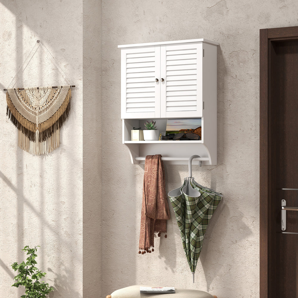 White wall-mounted medicine cabinet featuring convenient knobs and magnetic door catch for easy access in bathroom.