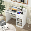 White desk with a large surface and two AC outlets, featuring an adjustable shelf for customized home office storage.