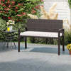 Wicker 2-seat bench with soft white cushion, handcrafted PE rattan, perfect for outdoor patios and gardens.