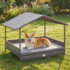 Wicker dog house with canopy in gray, elevated PE rattan bed for outdoor comfort and protection for small to medium.
