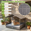 Elevated gray PE rattan dog bed with canopy, designed for indoor and outdoor use, providing comfort and weather.