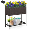 Wicker raised garden bed with removable liner, featuring a storage shelf for tools and vibrant flowers, ideal for.