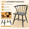 Windsor dining chair in sleek black, made from natural rubber wood, featuring a curved backrest for comfort and.