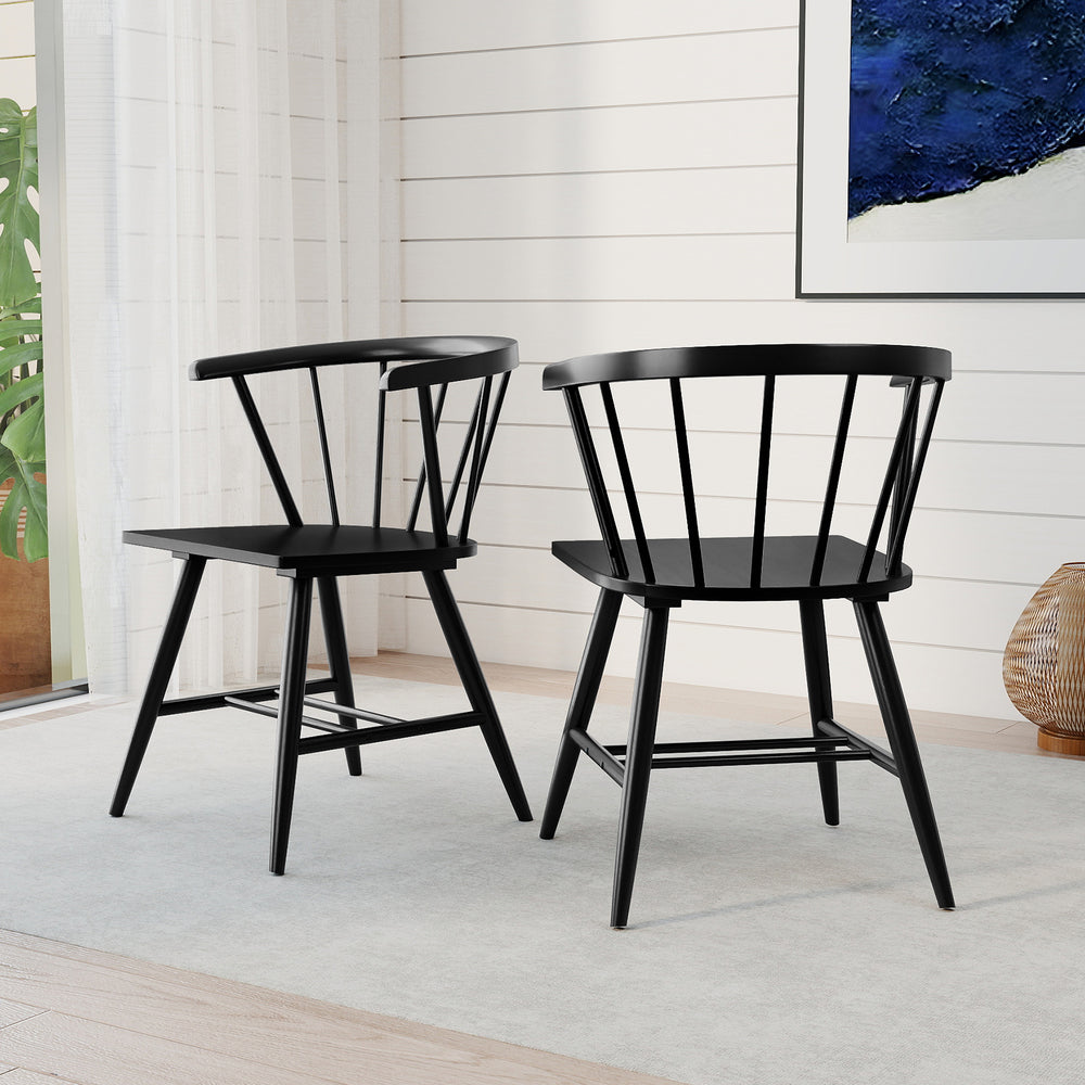 Windsor dining chair set in black, featuring ergonomic spindle backs and ample seating, perfect for kitchens and dining.