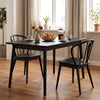 Black Windsor dining chairs with spindle backrest, featuring rubber wood construction and elegant retro design for.