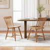 Windsor dining chair set with natural rubber wood frame and curved spindle backs, offering timeless style and comfort.