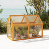 Wood cold frame greenhouse side view showcasing adjustable roof and transparent panels, perfect for protecting plants.