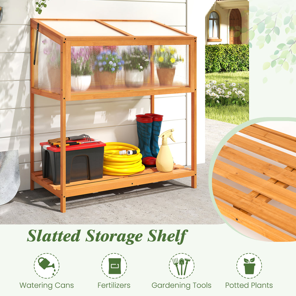 Wood cold frame greenhouse with openable roof and slatted storage shelf for organizing gardening tools and supplies.
