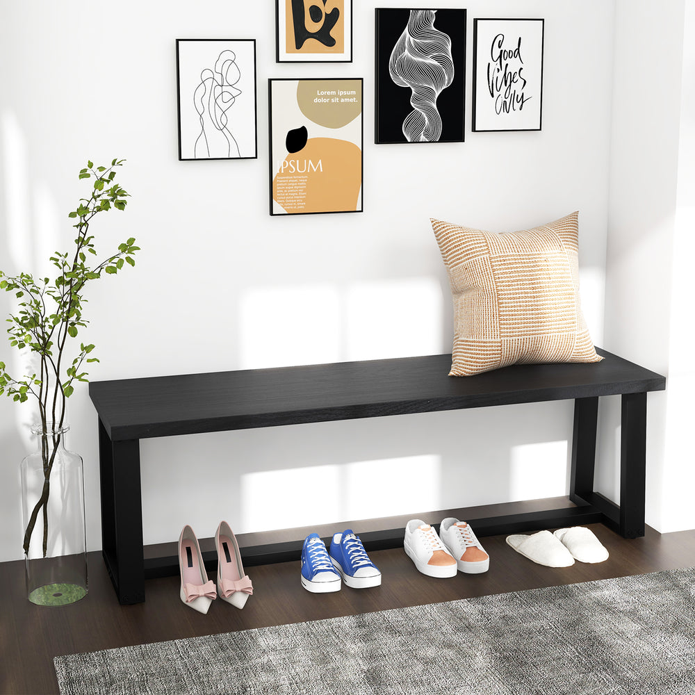 Black wood dining bench with metal frame, showcasing a cozy interior setup and ample shoe storage space.